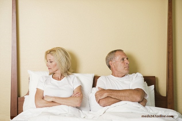 Unhappy_Couple_Sat_in_Bed